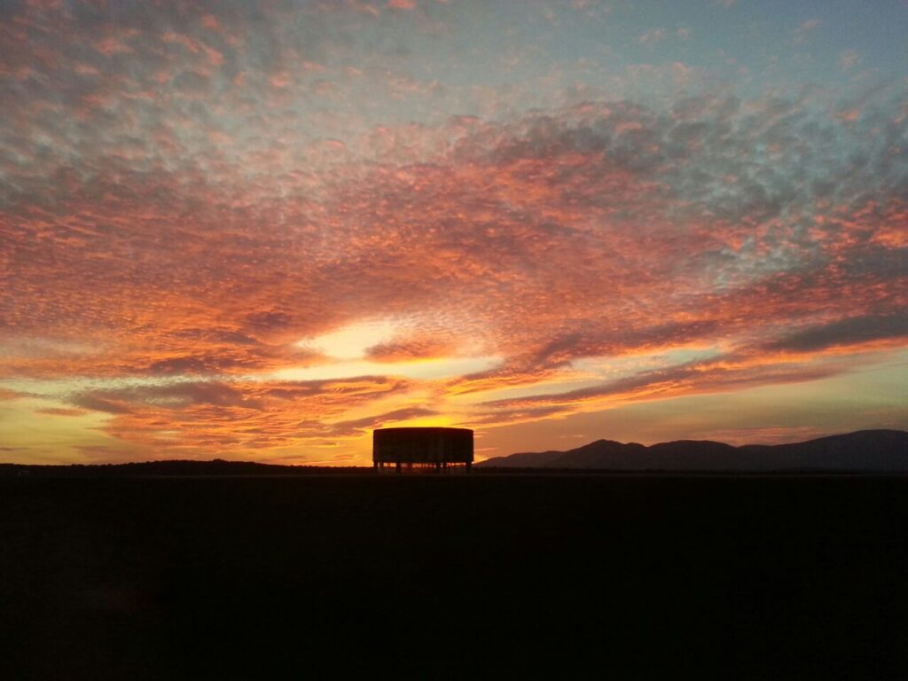 cama paisaje atardecer naranja