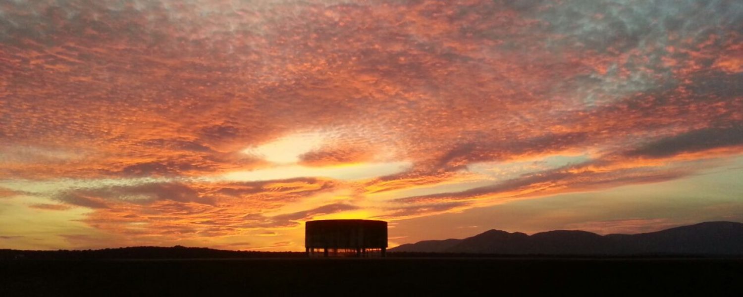 cama paisaje atardecer naranja